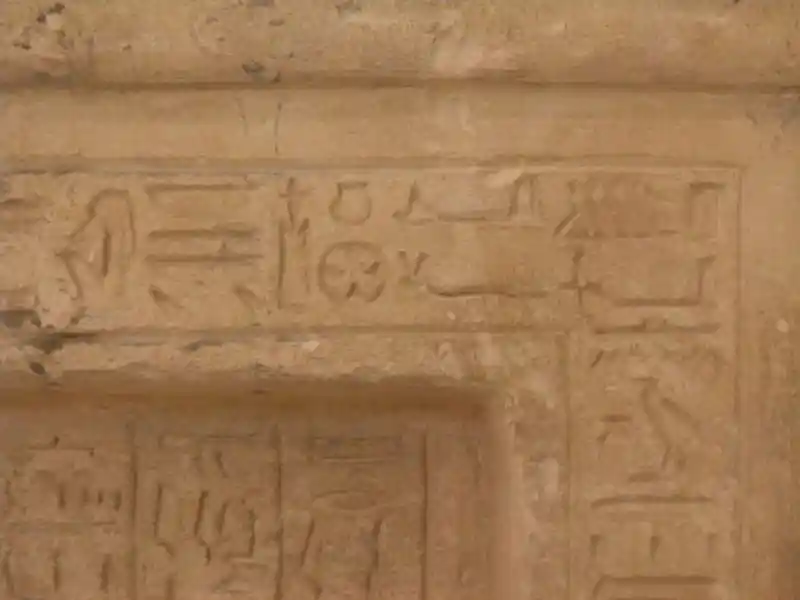 A cross without frame and a cross inside a circle symbols on a prechristian funerary stele